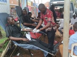 Priests in Hoima Catholic Diocese donate blood during the blood donation exercise in the Hoima communications week activities